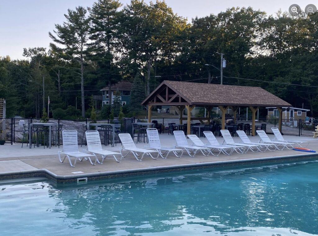 Pool with shade structure in background